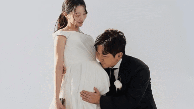 لي مين وو من شينهوا وزوجته يرحبان بمولود جديد